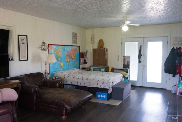 2771 S 850 E, Hagerman, ID 83332 - bedroom with french doors, wood finished floors, multiple windows, a textured ceiling, and a ceiling fan