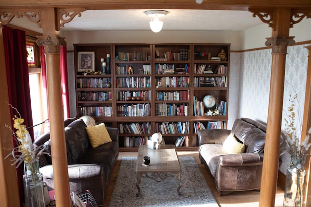 2771 S 850 E, Hagerman, ID 83332 - sitting room with plenty of natural light, ornate columns, wood finished floors, and bookshelves