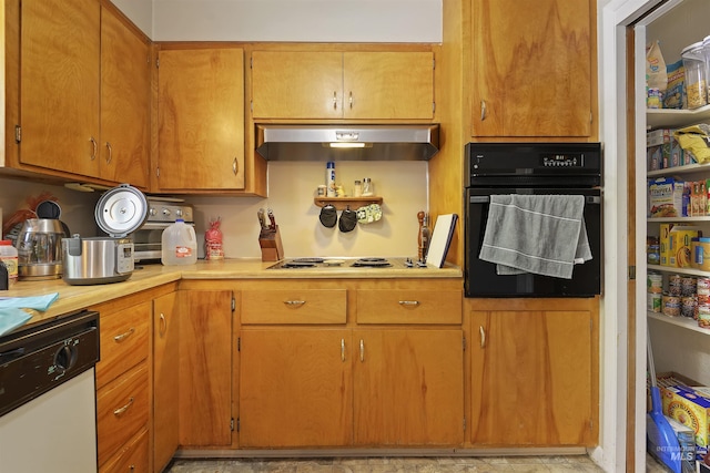 kitchen with electric cooktop, under cabinet range hood, dishwasher, light countertops, and black oven