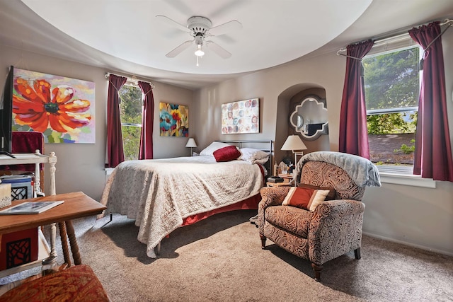 bedroom with ceiling fan and carpet flooring