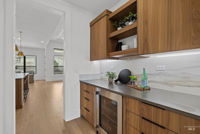 kitchen featuring open shelves, wine cooler, modern cabinets, and brown cabinets