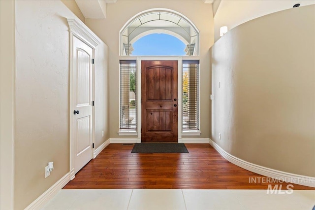 foyer entrance featuring hardwood / wood-style floors