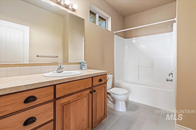 full bathroom featuring tile patterned flooring, vanity, shower / bathtub combination, and toilet