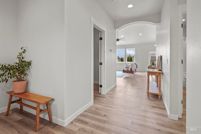 hall with light hardwood / wood-style flooring