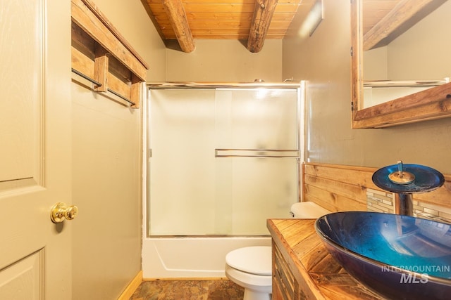 full bathroom with tile patterned floors, beamed ceiling, shower / bath combination with glass door, toilet, and wood ceiling