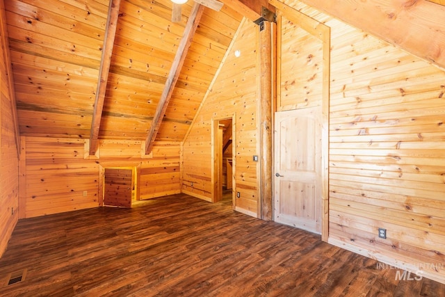 additional living space featuring wood ceiling, wooden walls, wood-type flooring, and vaulted ceiling with beams