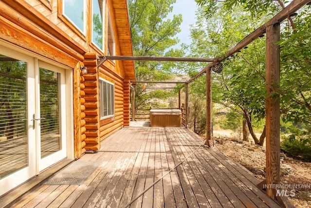 deck with a hot tub