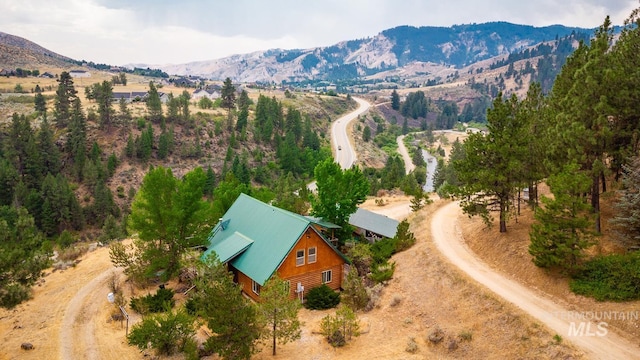 drone / aerial view featuring a mountain view