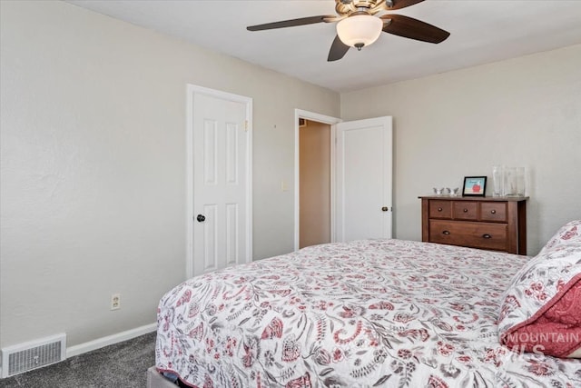 bedroom featuring visible vents, baseboards, carpet, and ceiling fan