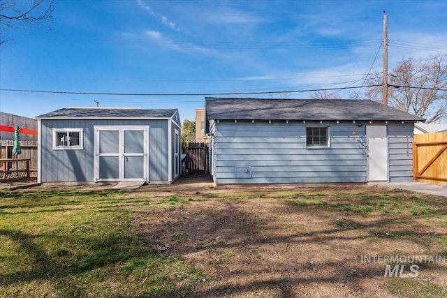 view of shed featuring a fenced backyard