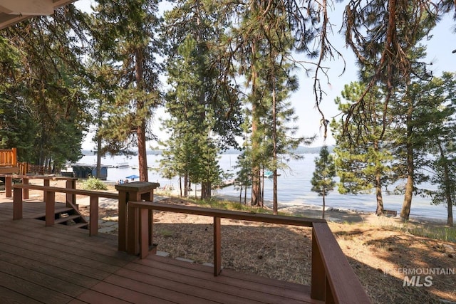 deck featuring a water view