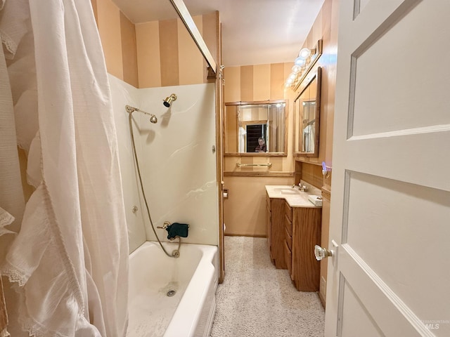 bathroom with shower / tub combo with curtain and vanity
