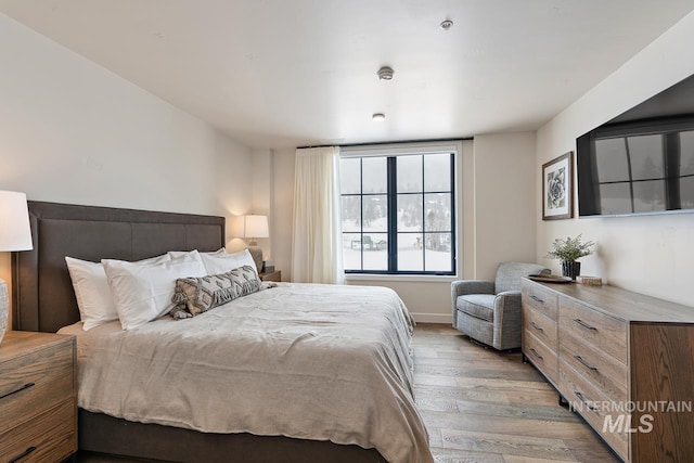 bedroom featuring light wood-type flooring