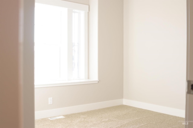 empty room featuring carpet