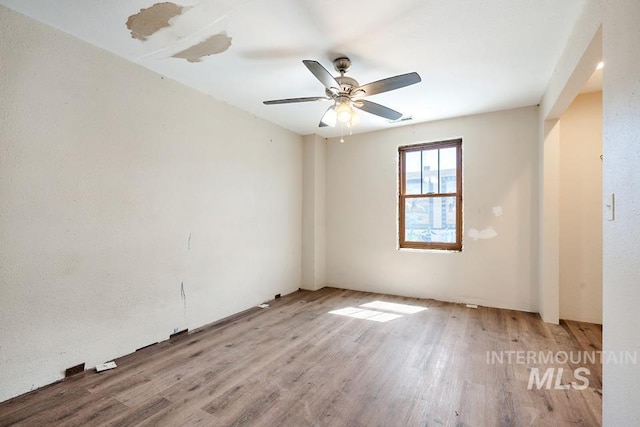201 W A St, Vale, OR 97918 - unfurnished room with wood finished floors and ceiling fan