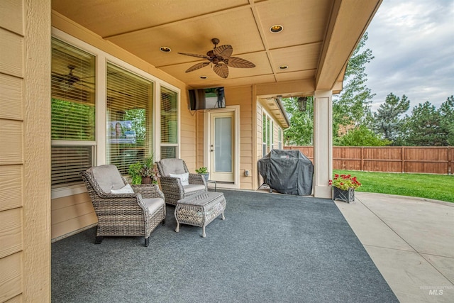 view of patio featuring ceiling fan and a grill