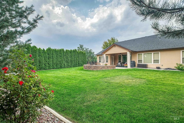 view of yard with a patio and cooling unit