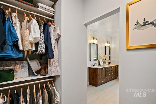 8701 W Suttle Lake Dr, Boise, ID 83714 - walk in closet featuring light tile patterned floors