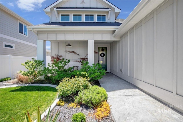 8701 W Suttle Lake Dr, Boise, ID 83714 - doorway to property with board and batten siding and roof with shingles