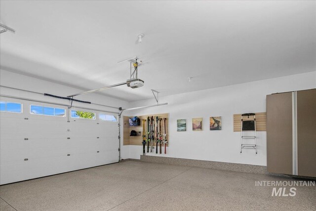 8701 W Suttle Lake Dr, Boise, ID 83714 - garage featuring a garage door opener