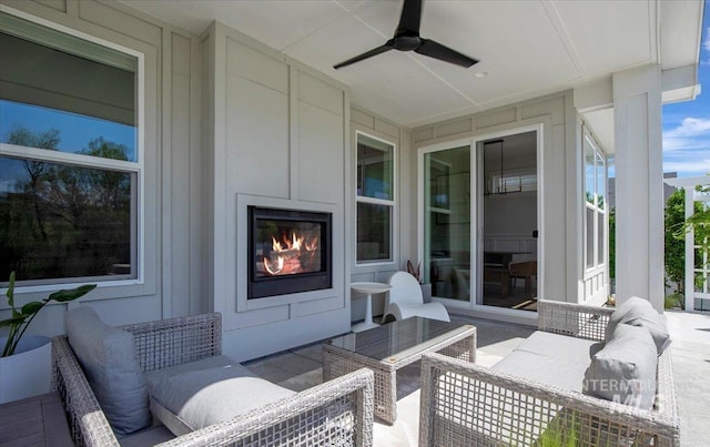 8701 W Suttle Lake Dr, Boise, ID 83714 - view of patio featuring an outdoor living space with a fireplace and a ceiling fan