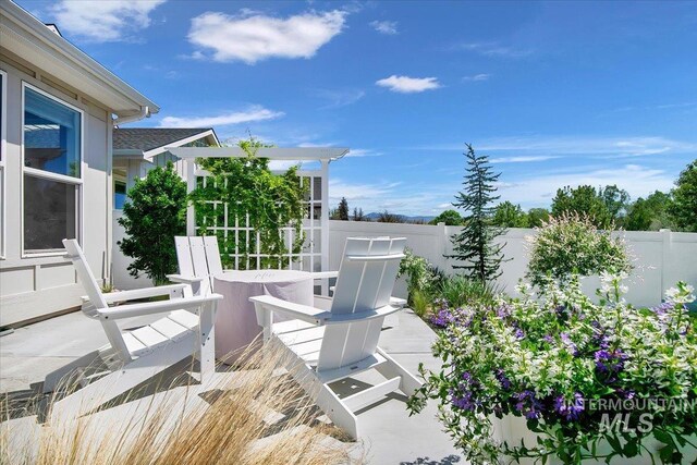 8701 W Suttle Lake Dr, Boise, ID 83714 - wooden deck with a fenced backyard