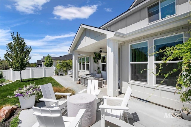 8701 W Suttle Lake Dr, Boise, ID 83714 - view of patio featuring ceiling fan, fence, and an outdoor hangout area