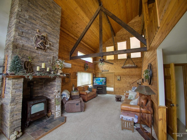 27 Park Ln, Boise, ID 83716 - living area featuring high vaulted ceiling, a wooden ceiling with exposed beams, a wood stove, wooden walls, and ceiling fan
