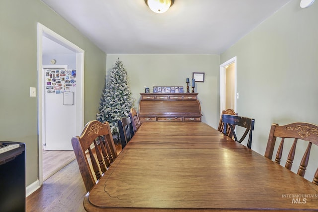 dining area featuring wood finished floors