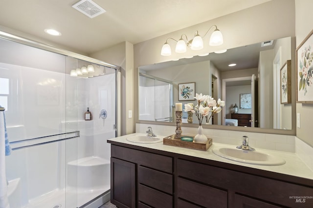 17785 N Onaway Ave, Nampa, ID 83687 - ensuite bathroom featuring double vanity and a shower stall