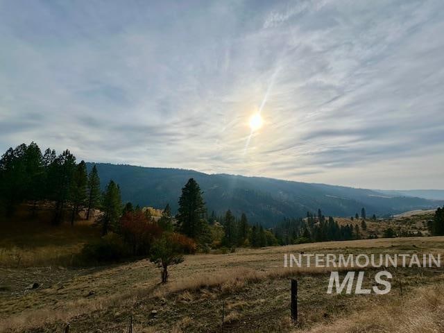 property view of mountains with a rural view