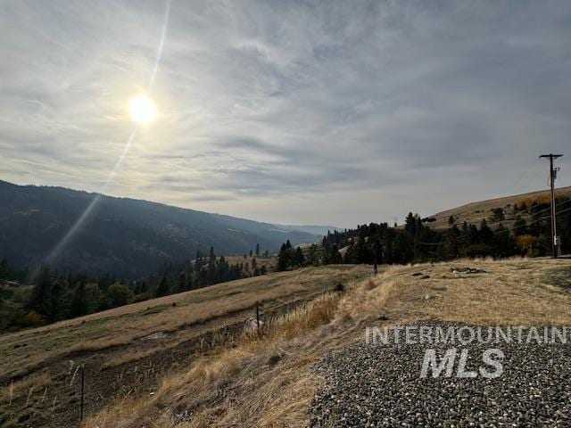 property view of mountains with a rural view