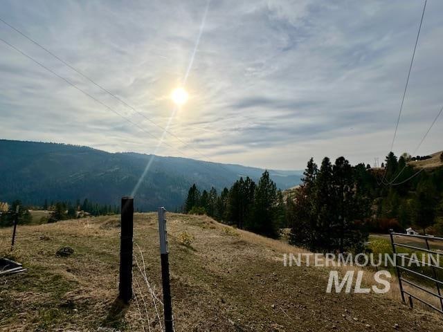 property view of mountains with a rural view