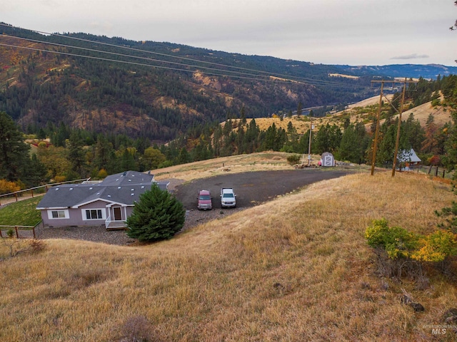 drone / aerial view featuring a mountain view