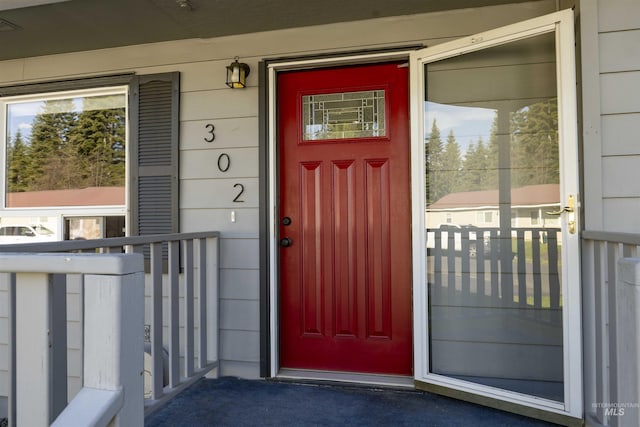 entrance to property with covered porch