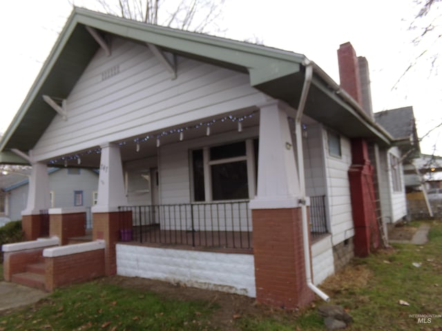 bungalow featuring covered porch