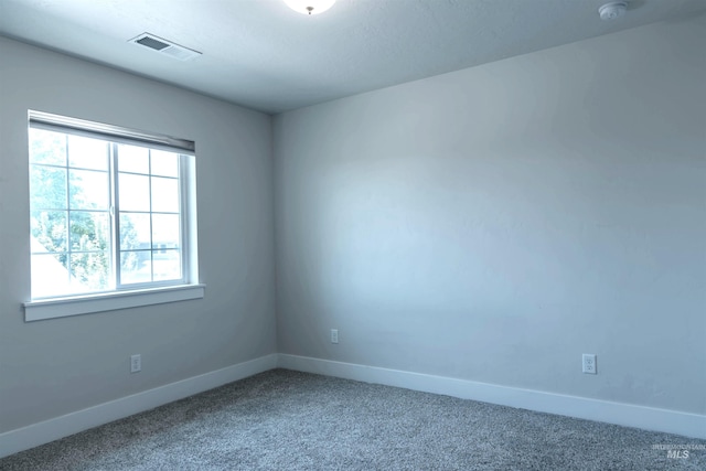 1946 W Windswept, Meridian, ID 83646 - carpeted empty room with baseboards and a smoke detector