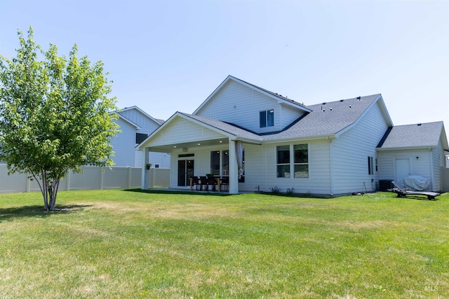 1946 W Windswept, Meridian, ID 83646 - back of house with a patio area and roof with shingles