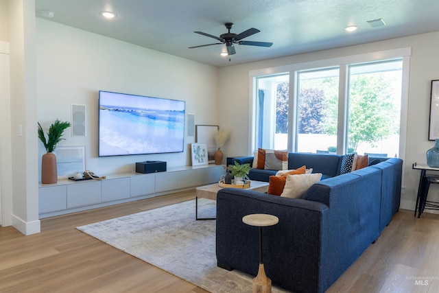 1946 W Windswept, Meridian, ID 83646 - living area featuring light wood-style flooring, a ceiling fan, and recessed lighting