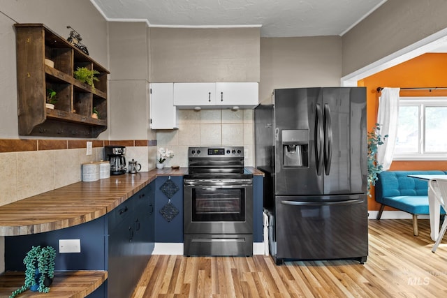4705 W Franklin Rd, Boise, ID 83705 - kitchen with black fridge with ice dispenser, electric stove, light wood-style flooring, and tasteful backsplash