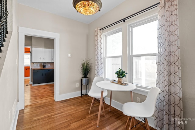 4705 W Franklin Rd, Boise, ID 83705 - dining room featuring light wood-type flooring