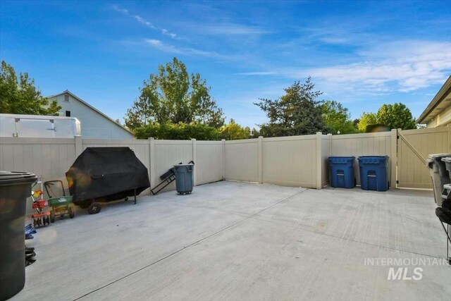 view of patio / terrace with fence and area for grilling