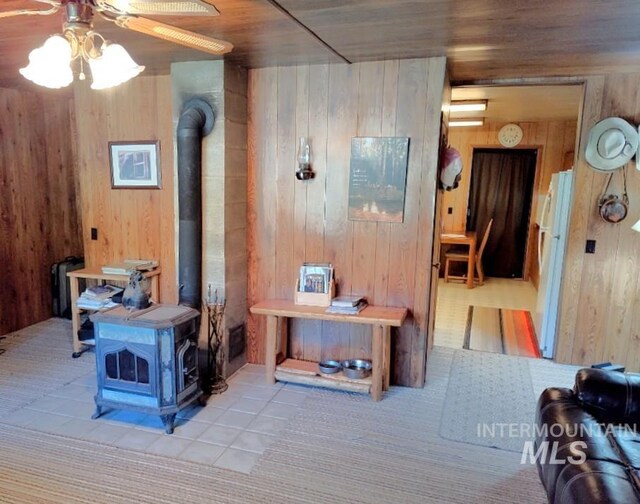 2738 Dixie Rd, Dixie, ID 83525 - interior space with wood walls and tile patterned floors