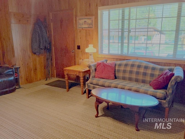 2738 Dixie Rd, Dixie, ID 83525 - living area with wood walls and carpet
