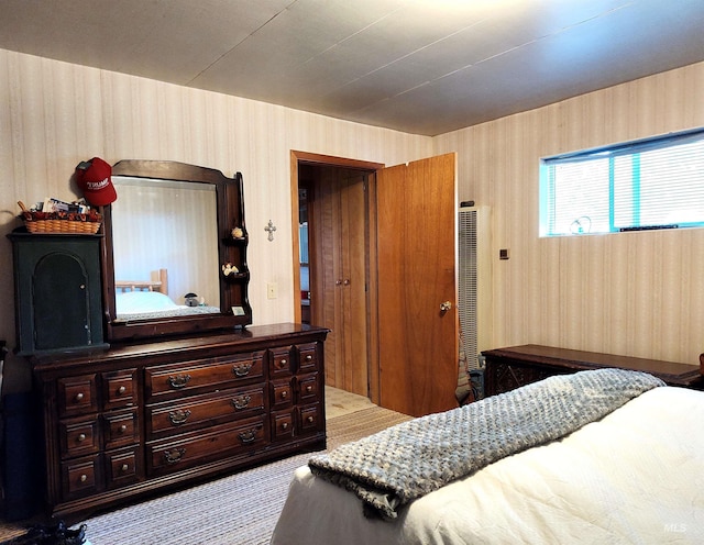 2738 Dixie Rd, Dixie, ID 83525 - carpeted bedroom featuring wallpapered walls and a heating unit