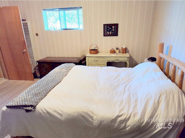 2738 Dixie Rd, Dixie, ID 83525 - bedroom featuring wallpapered walls and a heating unit