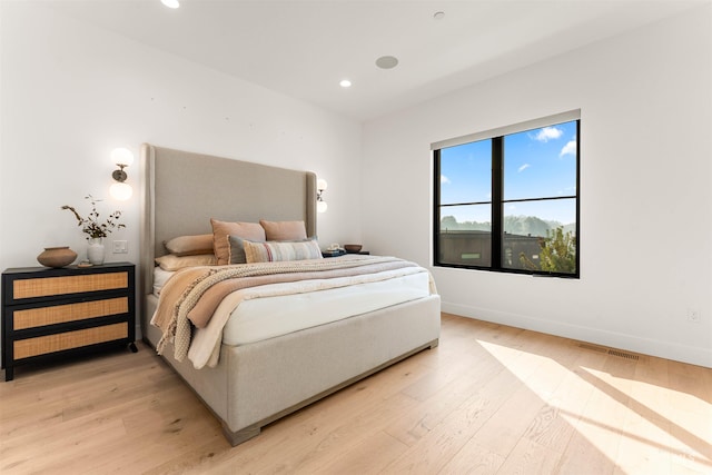 bedroom featuring light hardwood / wood-style flooring