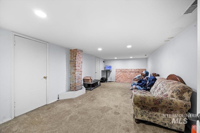 living area featuring carpet floors