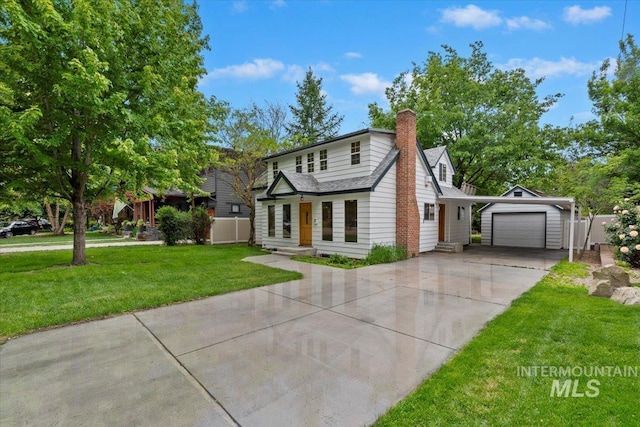 1915 N 23rd St, Boise, ID 83702 - view of front facade with concrete driveway, a chimney, a front lawn, a garage, and entry steps