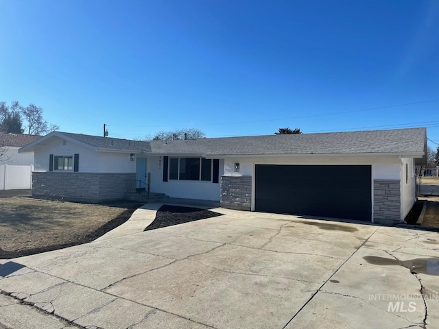 single story home with a garage